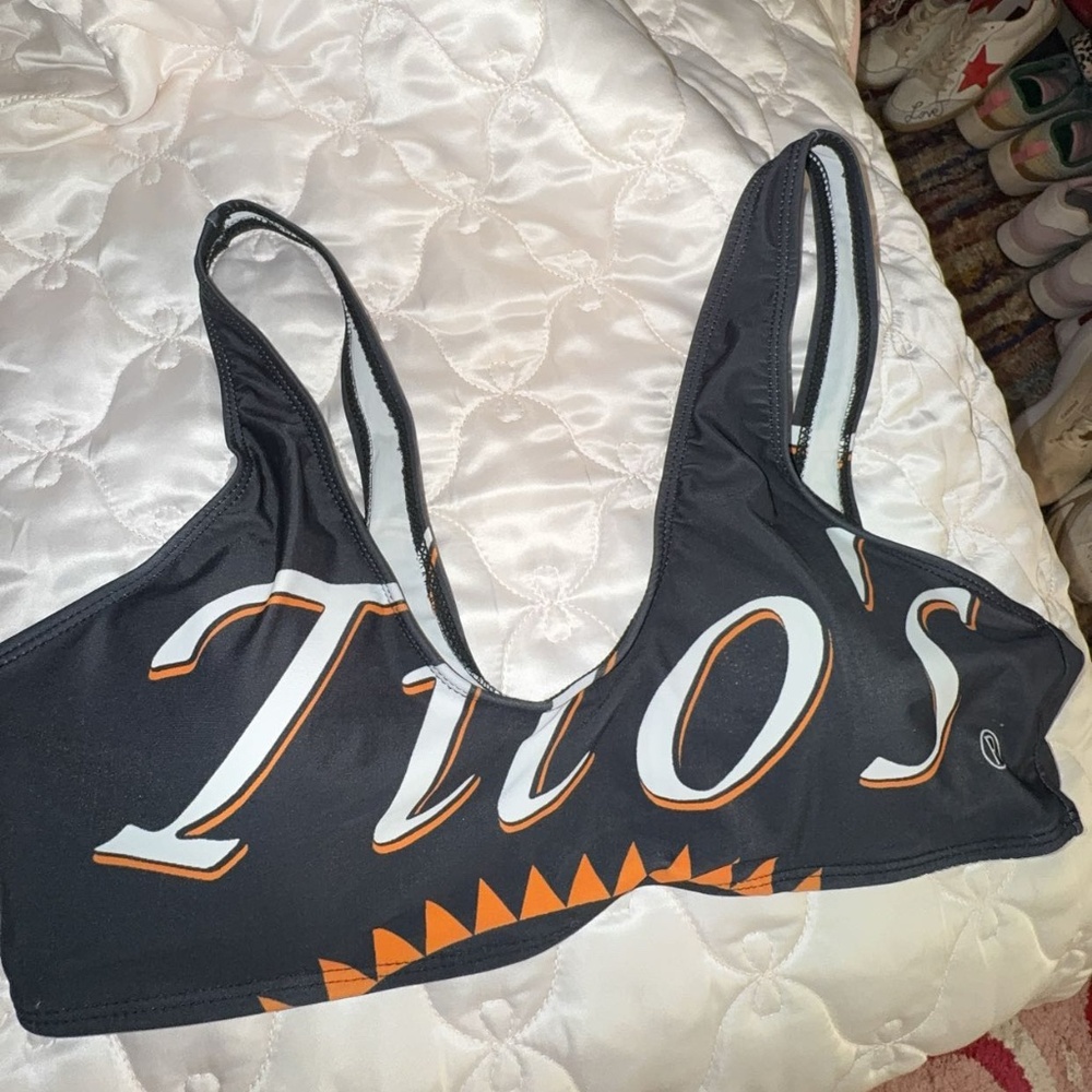 Tito’s swim suit top